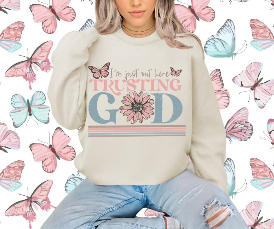 I’m just out here trusting God crewnecks